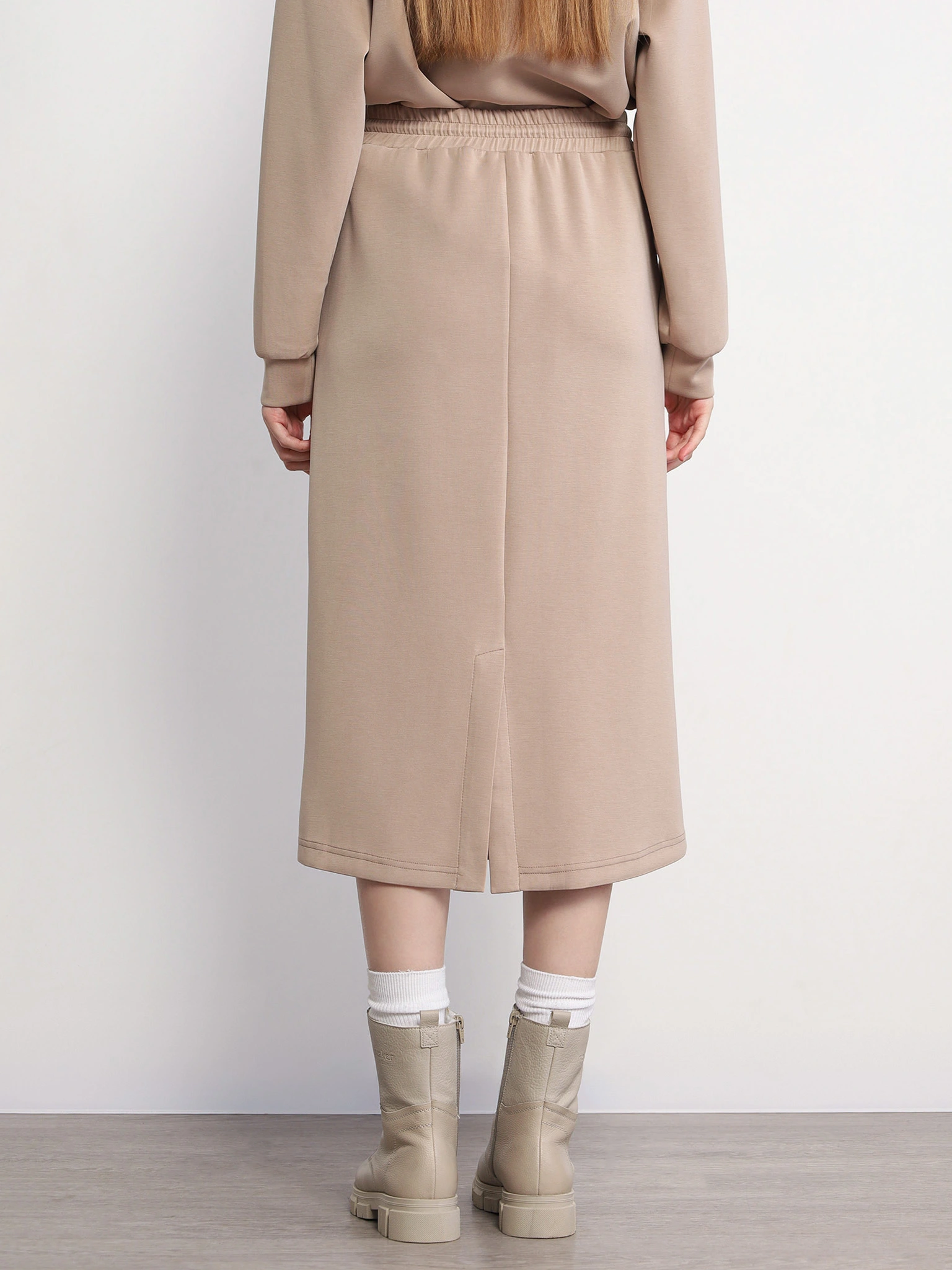 Юбка трикотажная бежевого цвета с эластичным поясом